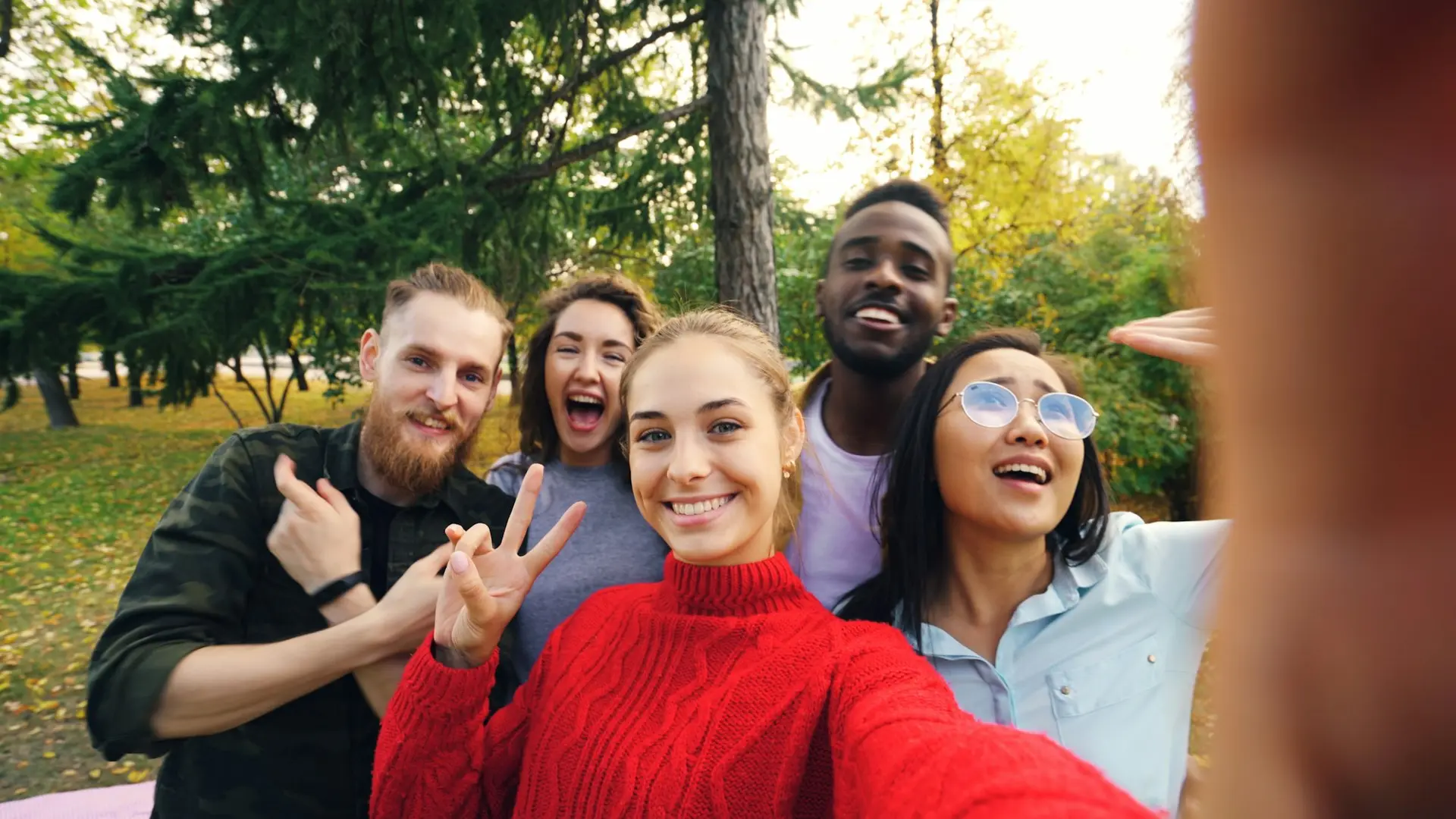 Friends taking a selfie outdoors
